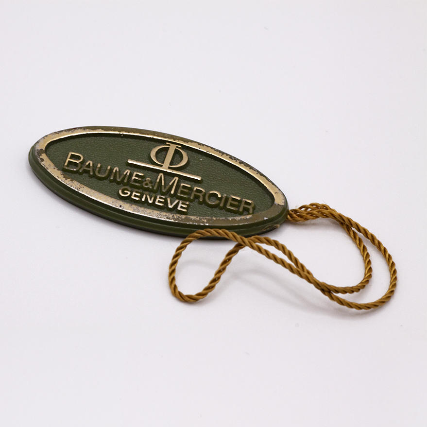 C_ACCESSORI_30 – Tag Baume e Mercier verde