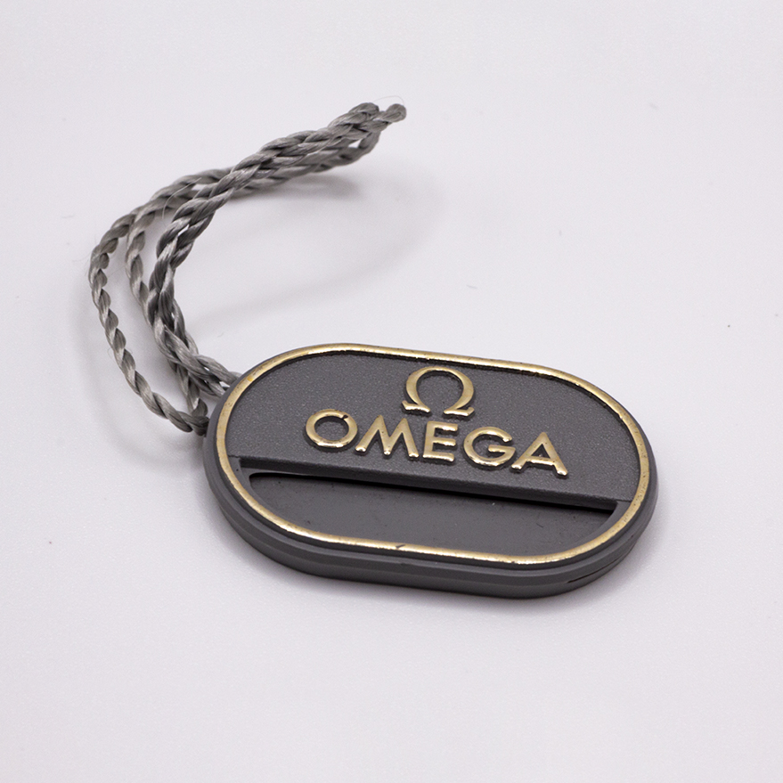 C_ACCESSORI_32 – Tag Omega grigio